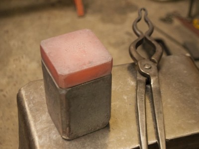 A plate of W1 was forged to fit block of mild steel.