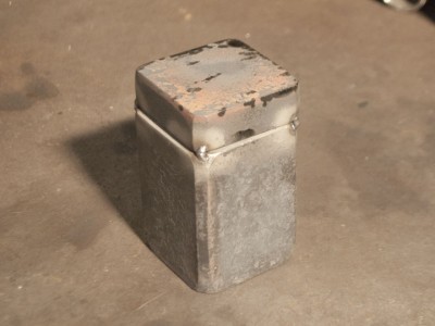 The W1 plate was tacked to the block on the corners.