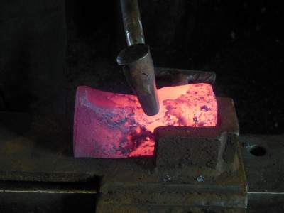 Fullering a notch between the eye and blade.  This is a standard feature on the Ryarbile.
